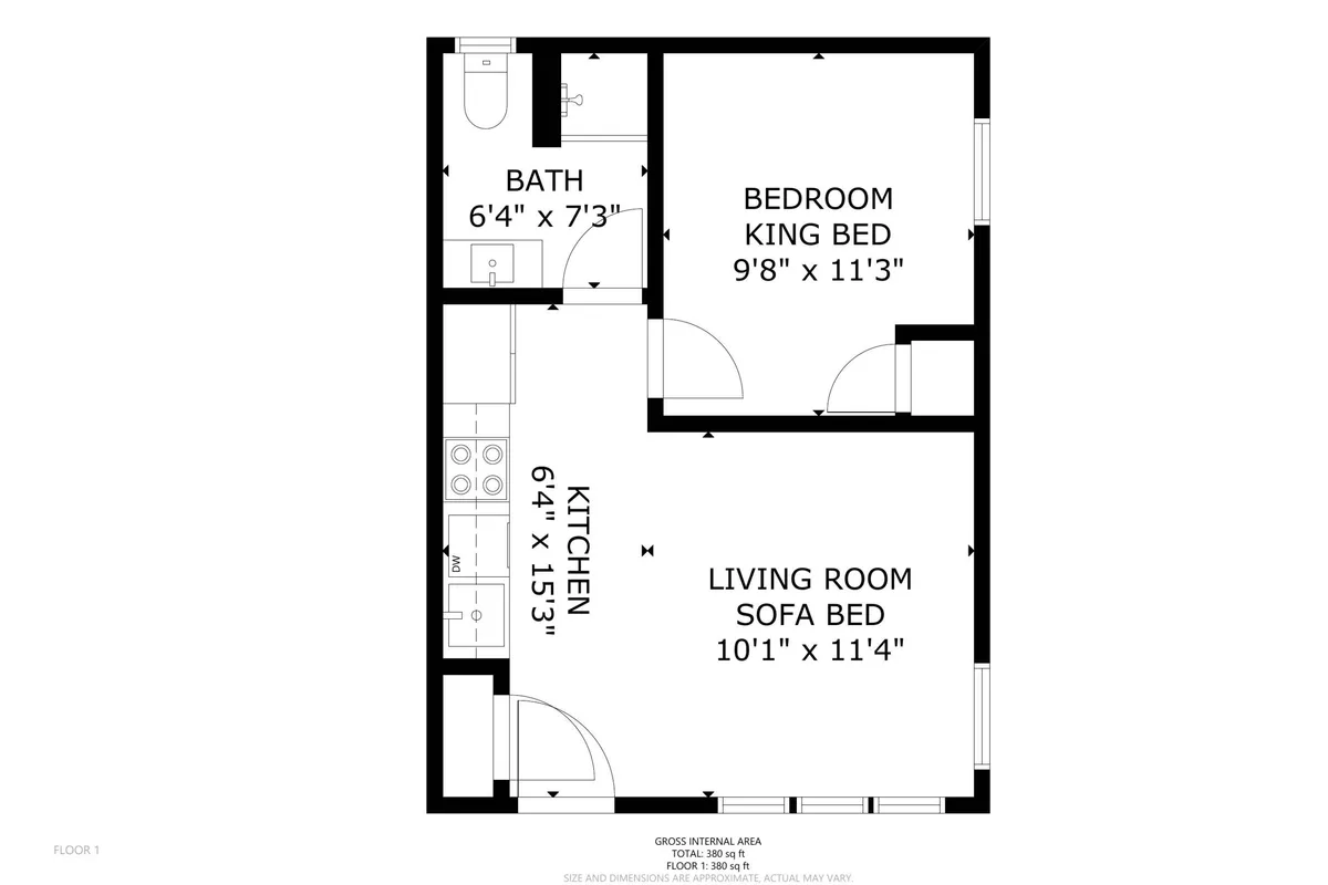 A well-lit, spacious interior showing a king bed with crisp linens, a comfortable sofa bed in the living area, a small kitchen, and a glimpse of the bathroom. The room is inviting and practical, capturing both comfort and versatility for different types of travelers.